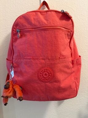 Kipling | Bags | Silver Backpack With Pink Pom Pom | Poshmark display picture 1